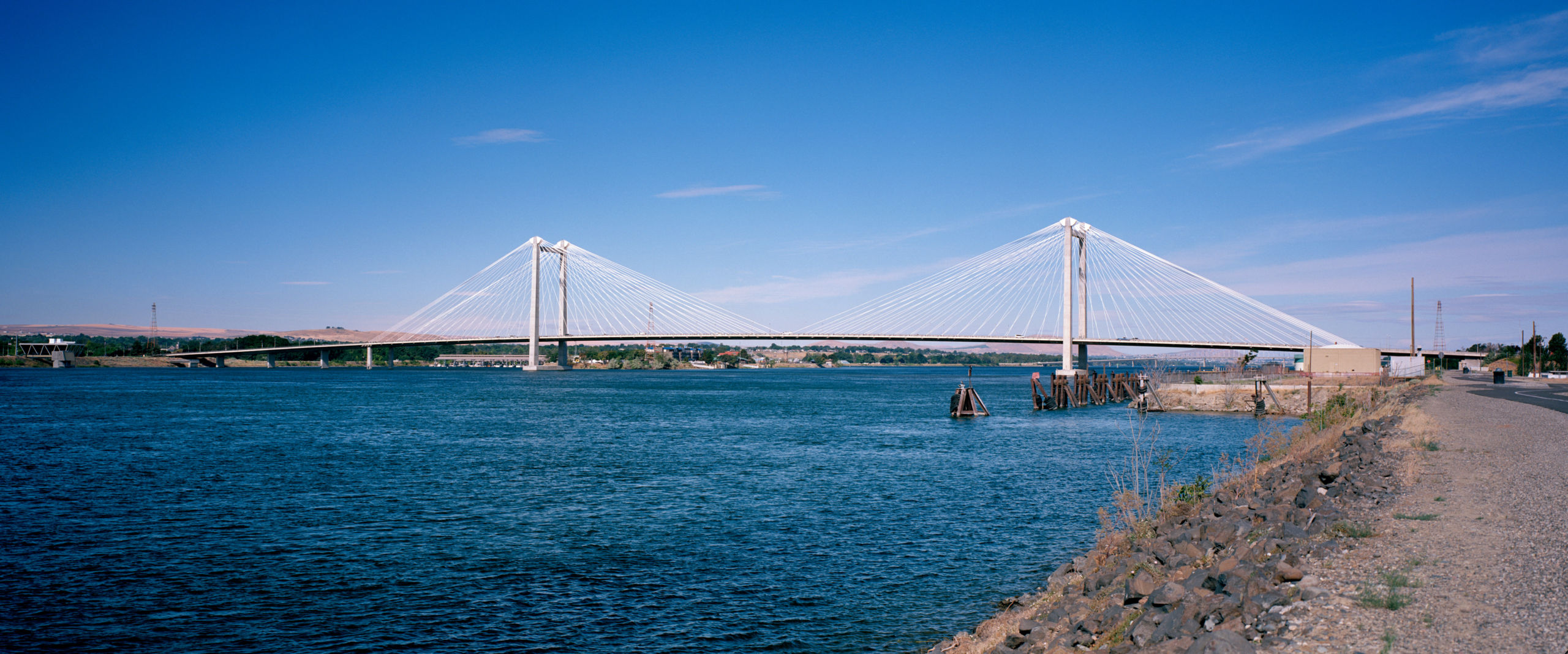 The Ed Hendler Cable Bridge spanning the Columbia River between Pasco and Kennewick in the Tri-Cities, under a clear blue sky